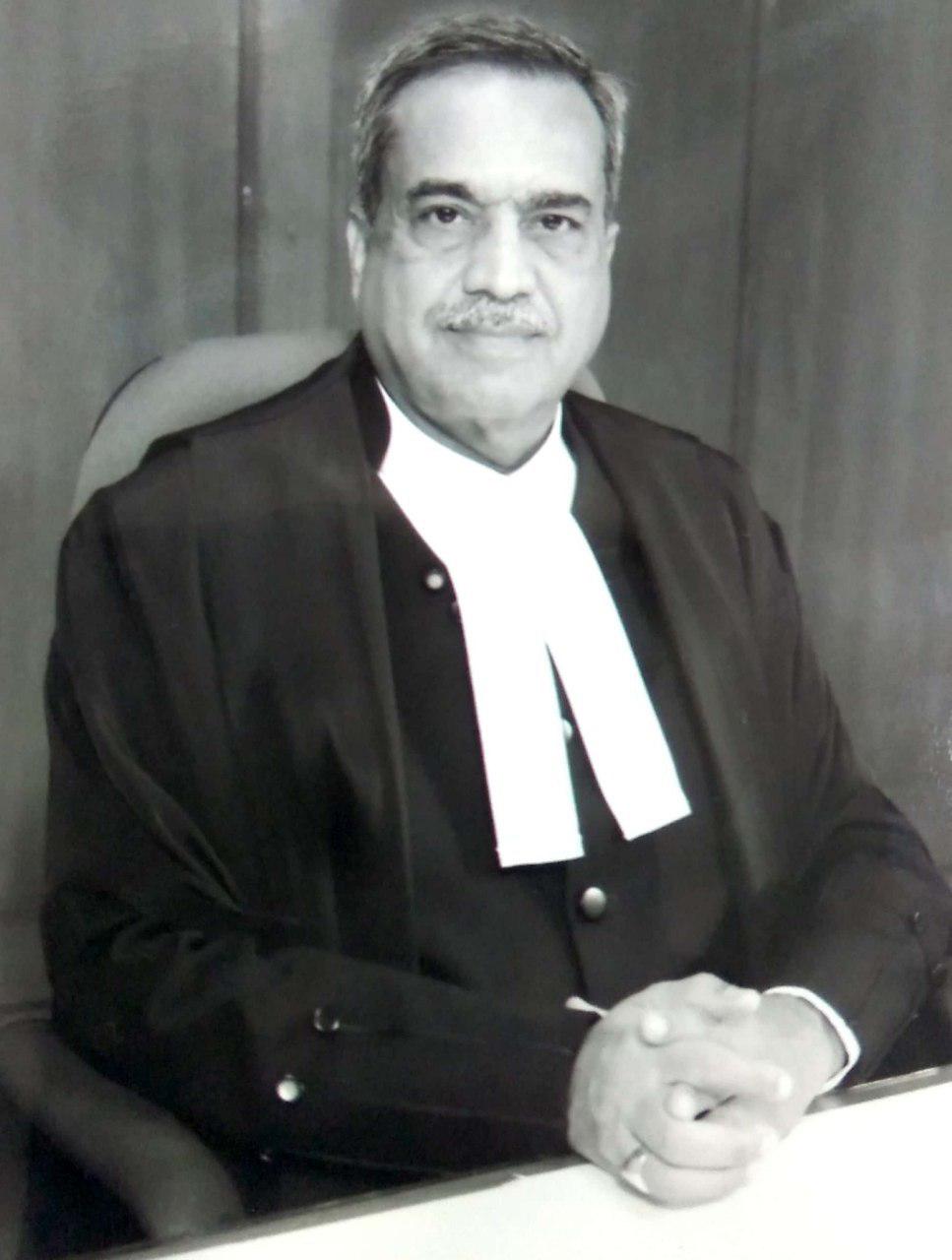 Justice Mukeshkumar Rasikbhai Shah